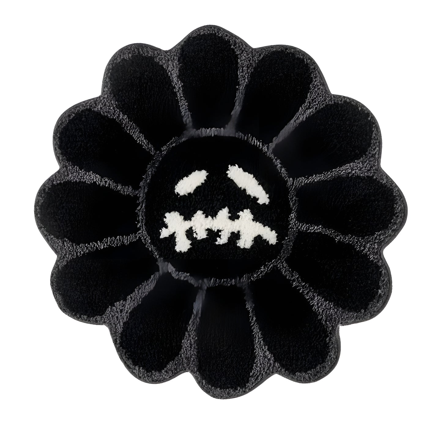 Black flower shaped tufted rug on a living room floor