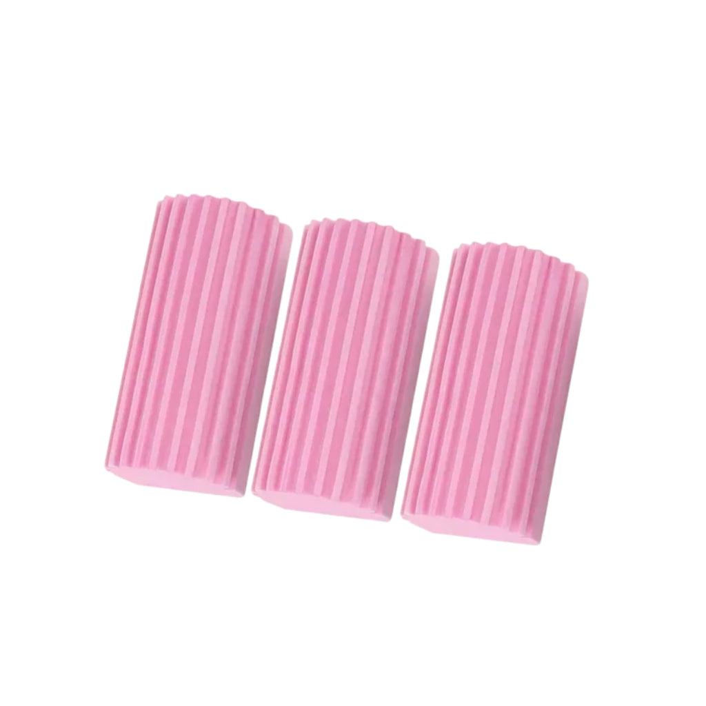 pink dish scrub sponge cleaning a black pan in a kitchen sink
ribbed PVA cleaning sponge used for easy stain removal
yellow gray and pink kitchen cleaning sponges shown together
hand holding a dish scrub sponge inside a soapy pan
reusable cleaning sponge for dishes pans and kitchen surfaces