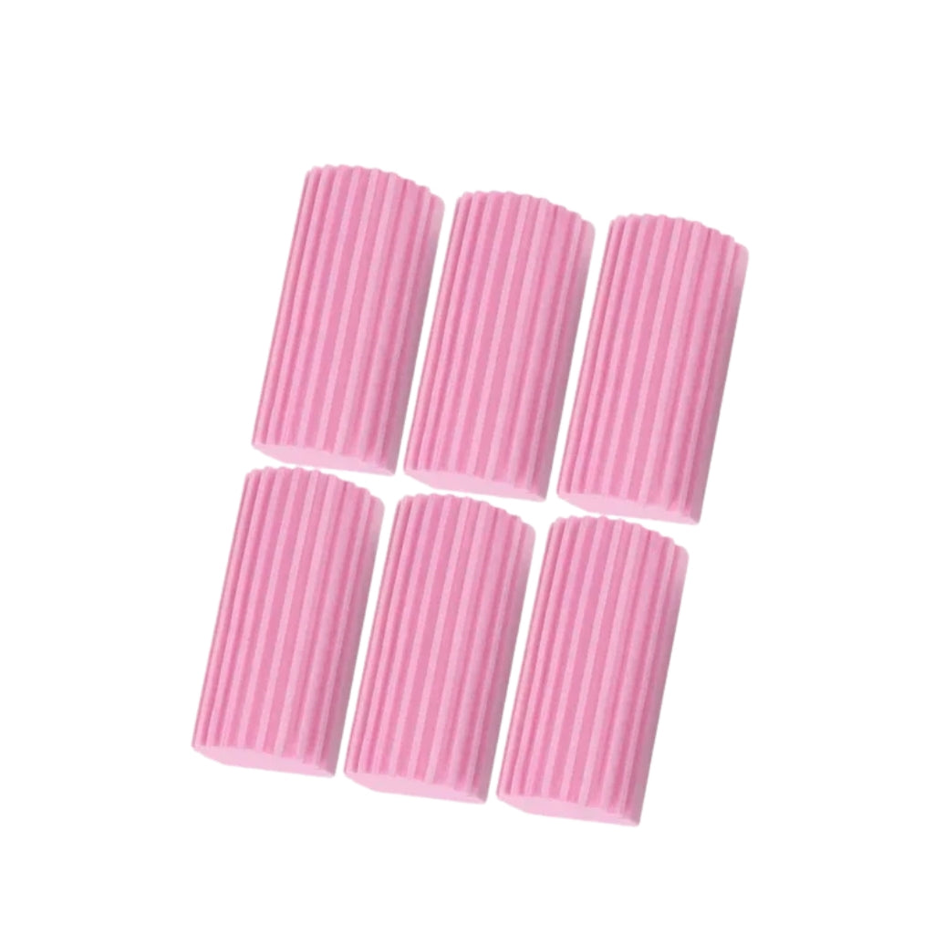 pink dish scrub sponge cleaning a black pan in a kitchen sink
ribbed PVA cleaning sponge used for easy stain removal
yellow gray and pink kitchen cleaning sponges shown together
hand holding a dish scrub sponge inside a soapy pan
reusable cleaning sponge for dishes pans and kitchen surfaces