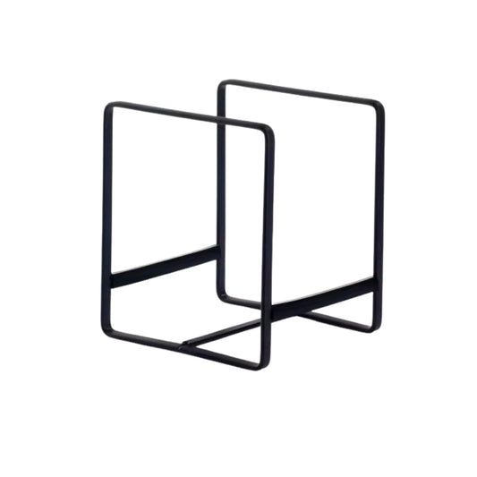 black metal dish drying rack holding plates on a kitchen counter.
dish drying rack with open frame design for plate storage.