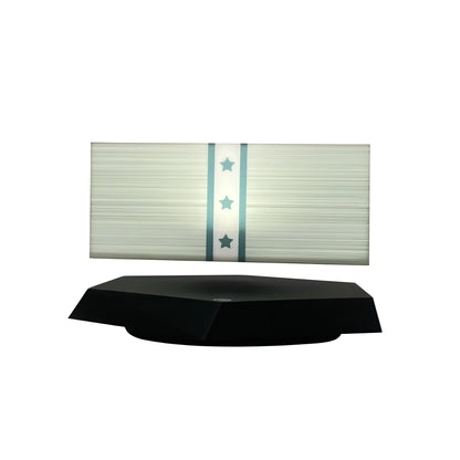 novelty lamps with glowing levitating money design on black base
magnetic levitation LED desk lamp with floating dollar-style shape
novelty LED light showing warm orange glow for office decor
floating money night light on desk with black magnetic base