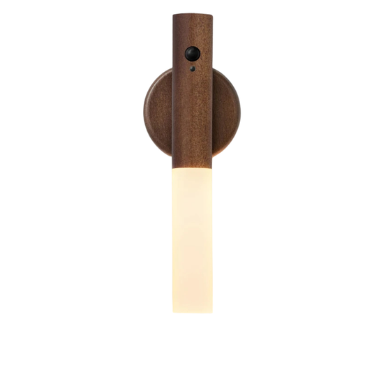 wood tone night lights mounted on wall with warm LED glow.
motion sensor night light with vertical modern wall lamp design.