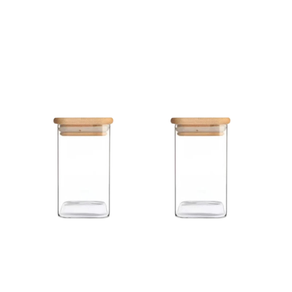 Glass food storage containers with bamboo lids filled with coffee beans and spices
Clear glass storage jars for kitchen ingredients with airtight wooden lids
Glass jars with lids displaying candy, grains, herbs, and seasonings
Airtight glass storage containers with bamboo lids arranged on a white background
Kitchen storage jars with clear glass bodies and natural bamboo tops