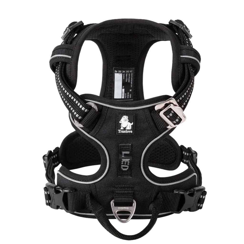 Black dog harnesses adjustable pet harness with padded chest and reflective trim

No pull dog harness with handle and quick release buckles on white background

Adjustable pet harness for dogs made with black nylon and reflective stitching

Dog harness with handle and metal leash attachment points for walking control

Padded pet harness for dogs with reflective straps and front chest support