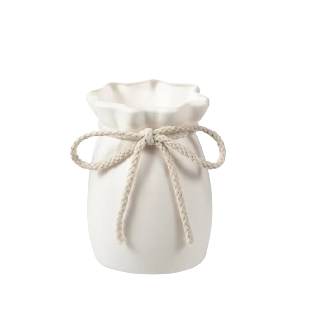 white flower vase with bow rope detail and scalloped top edge
plastic white vase with decorative bow for tabletop home decor
white tabletop flower vase with soft curved shape and rope bow
modern white vase for living room bedroom or office decoration