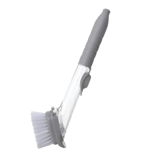dish scrubber with built in soap dispenser cleaning frying pan
gray kitchen brush with soap dispensing handle and bristles