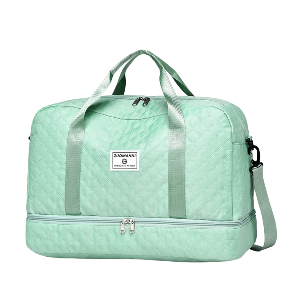 woman carrying pink travel duffel bag beside a suitcase
quilted travel duffel bags in pink and cream colors
lightweight nylon duffel bag placed on blue luggage
large soft travel bag with zipper closure and shoulder strap
weekender duffel bag shown in a travel setting