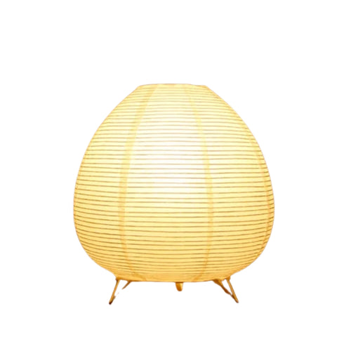 rice paper table lamps glowing warm light on wooden surface.
Japanese style table lamp with white lantern shade and warm LED glow.