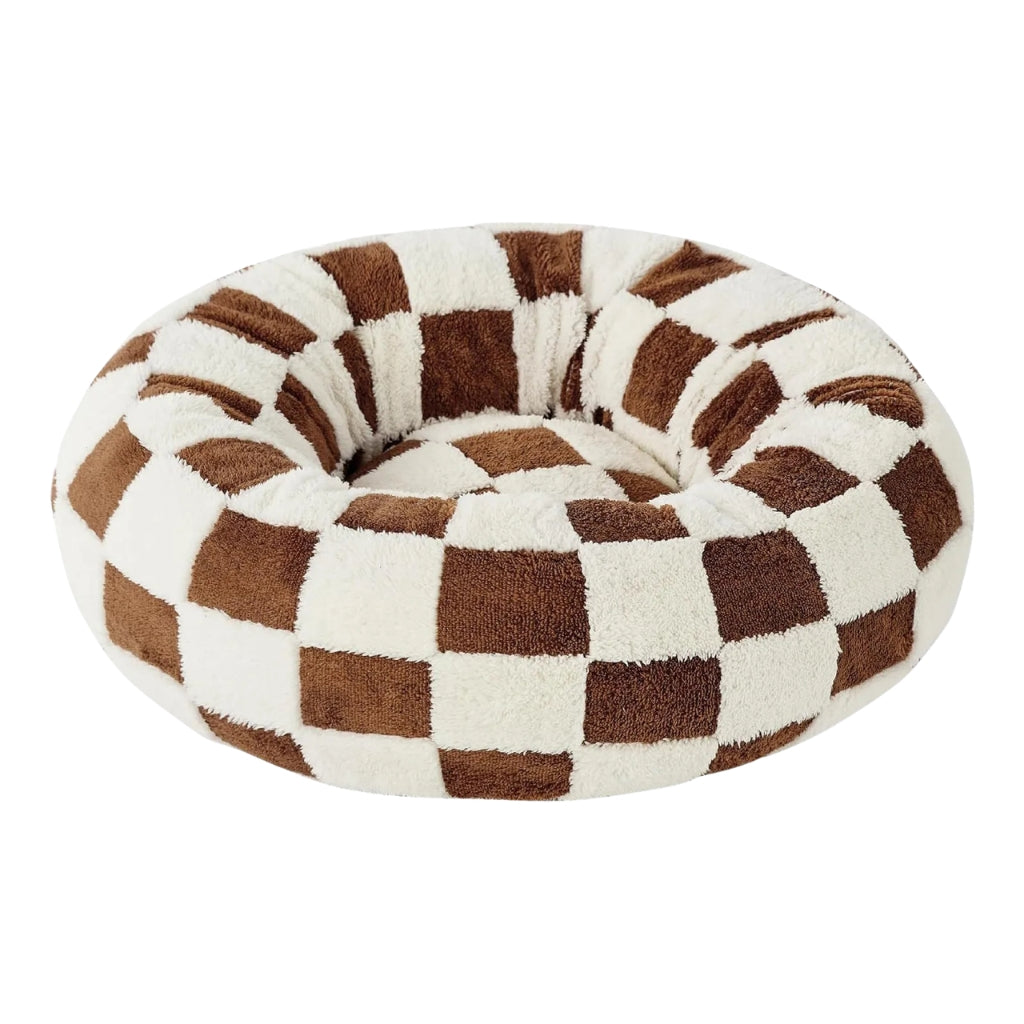 Washable dog bed for puppies shown with round cushioned pet bed design