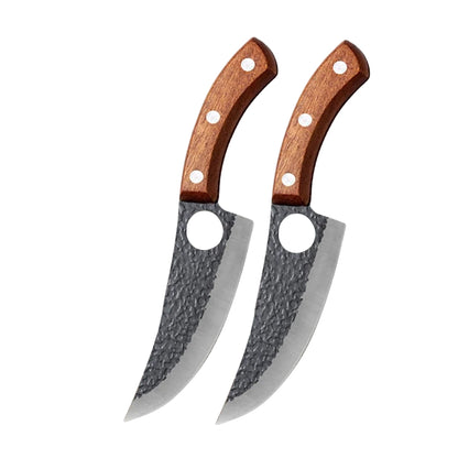 Hand forged kitchen knife with wooden handle on a white kitchen counter