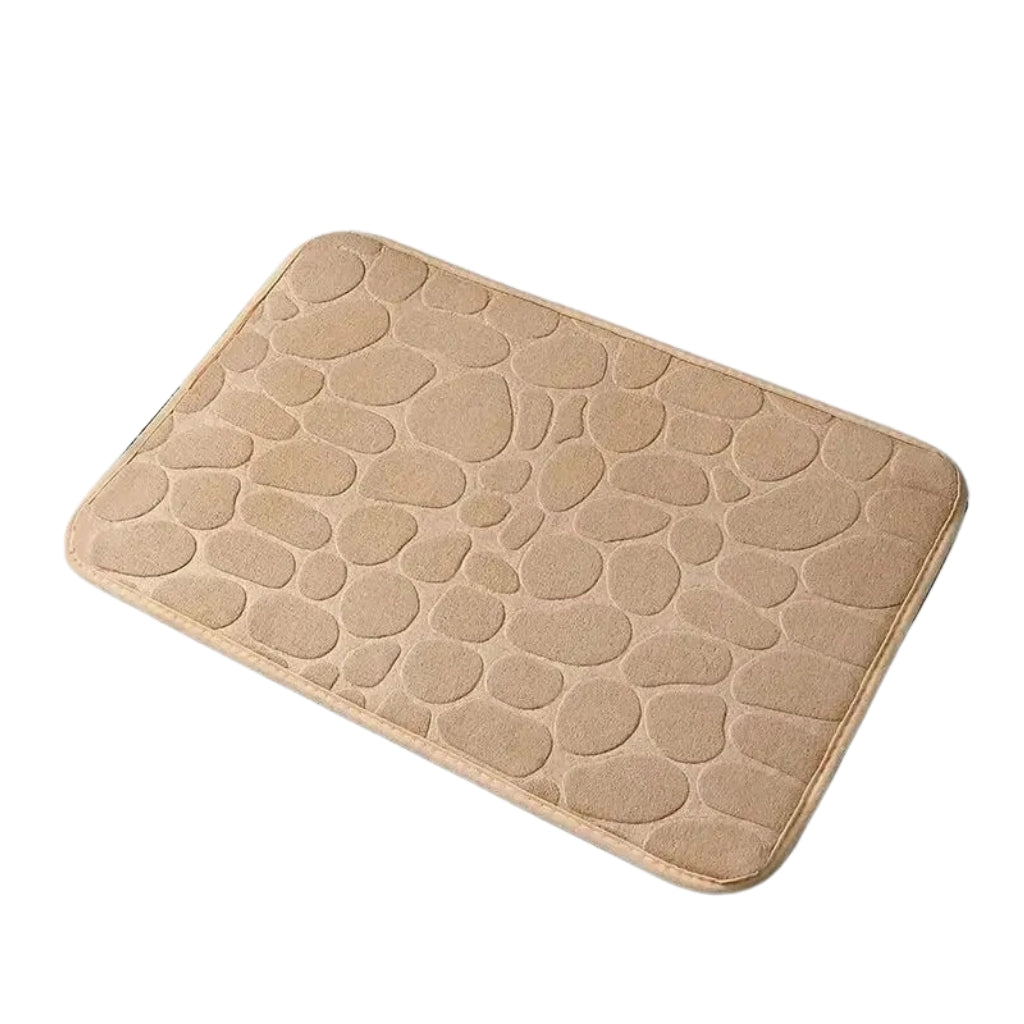 Embossed bathroom rug with cushioned memory foam design