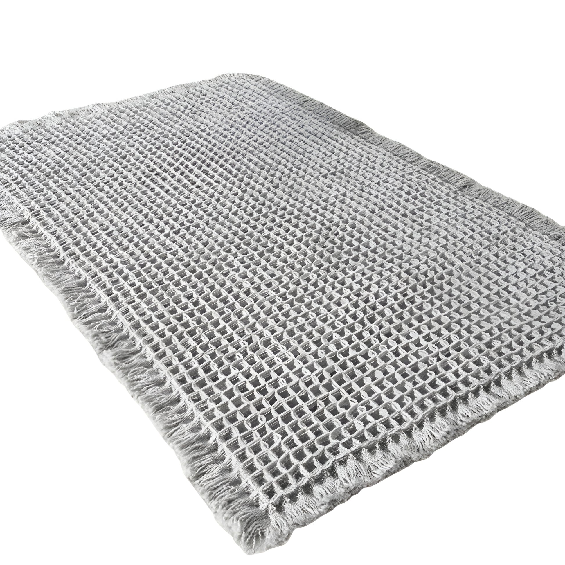 beige Bath Rugs & Mats with woven texture placed beside a shower
gray bathroom rug with raised waffle pattern and fringed edges
microfiber bath mat on bathroom floor with foot stepping on it
textured bathroom mats shown in beige and gray color options