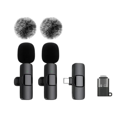 wireless microphone connected to a smartphone with USB C receiver
small lavalier microphone held beside a phone for recording
plug and play wireless microphone set with transmitter and receiver
portable microphones for phone video recording and live streaming
wireless lavalier mic shown with smartphone connection steps