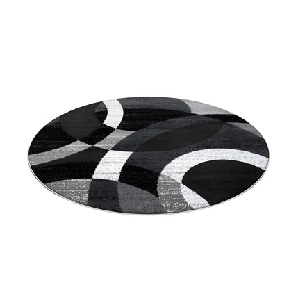 Round black and gray geometric area rug in a modern living room
Large washable rug with abstract pattern under living room seating area
Modern round area rugs shown on a light floor in a home interior
Black white and gray geometric rugs displayed in a spacious room
Soft round living room rug with modern curved pattern design