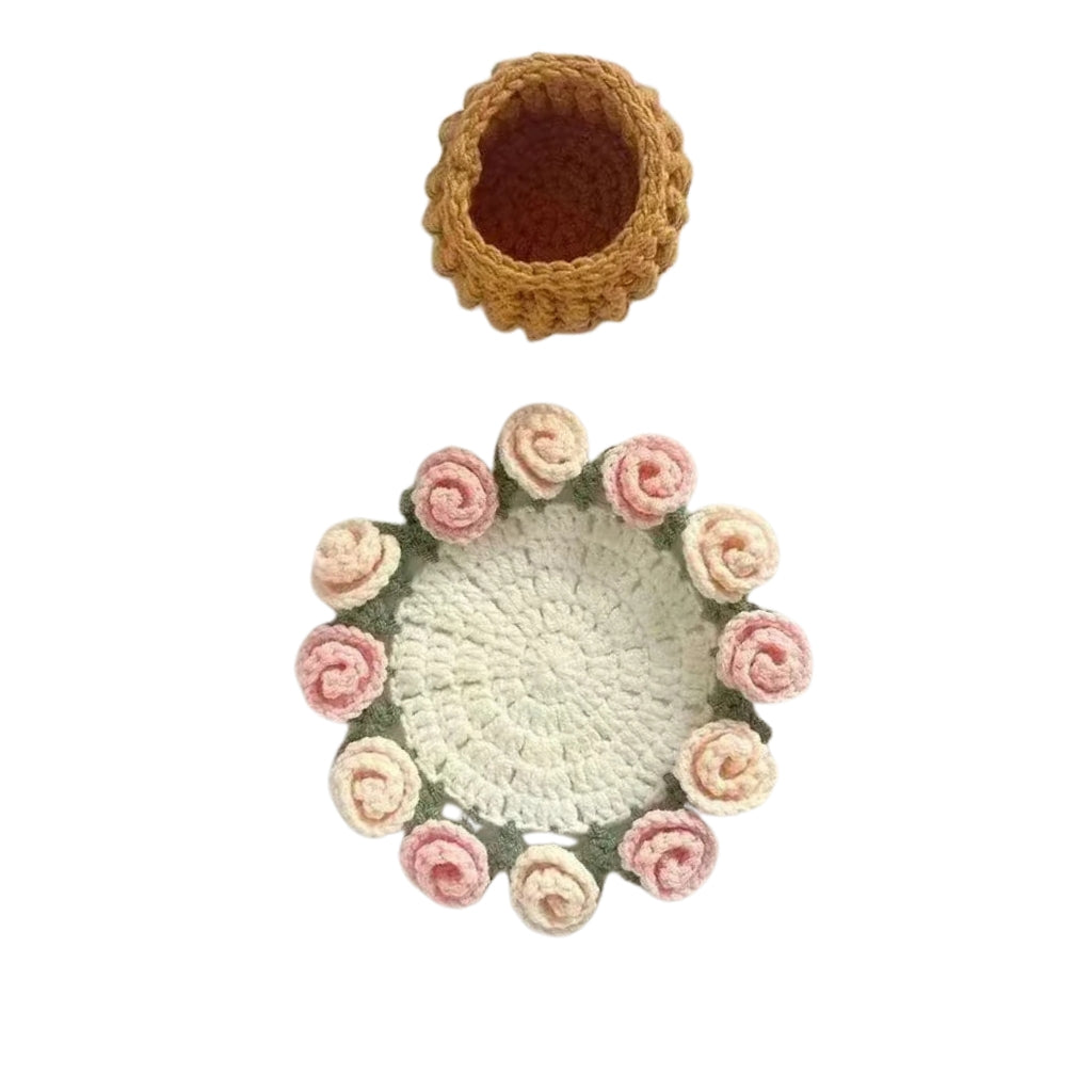 crochet flower coaster designed like a red rose bouquet in a woven basket
red rose crochet coasters arranged as a small flower bouquet
handmade style crochet flower coaster displayed on a table
crochet rose coasters with yellow basket shaped holder
red flower Coasters shown as cup pads and decorative bouquet