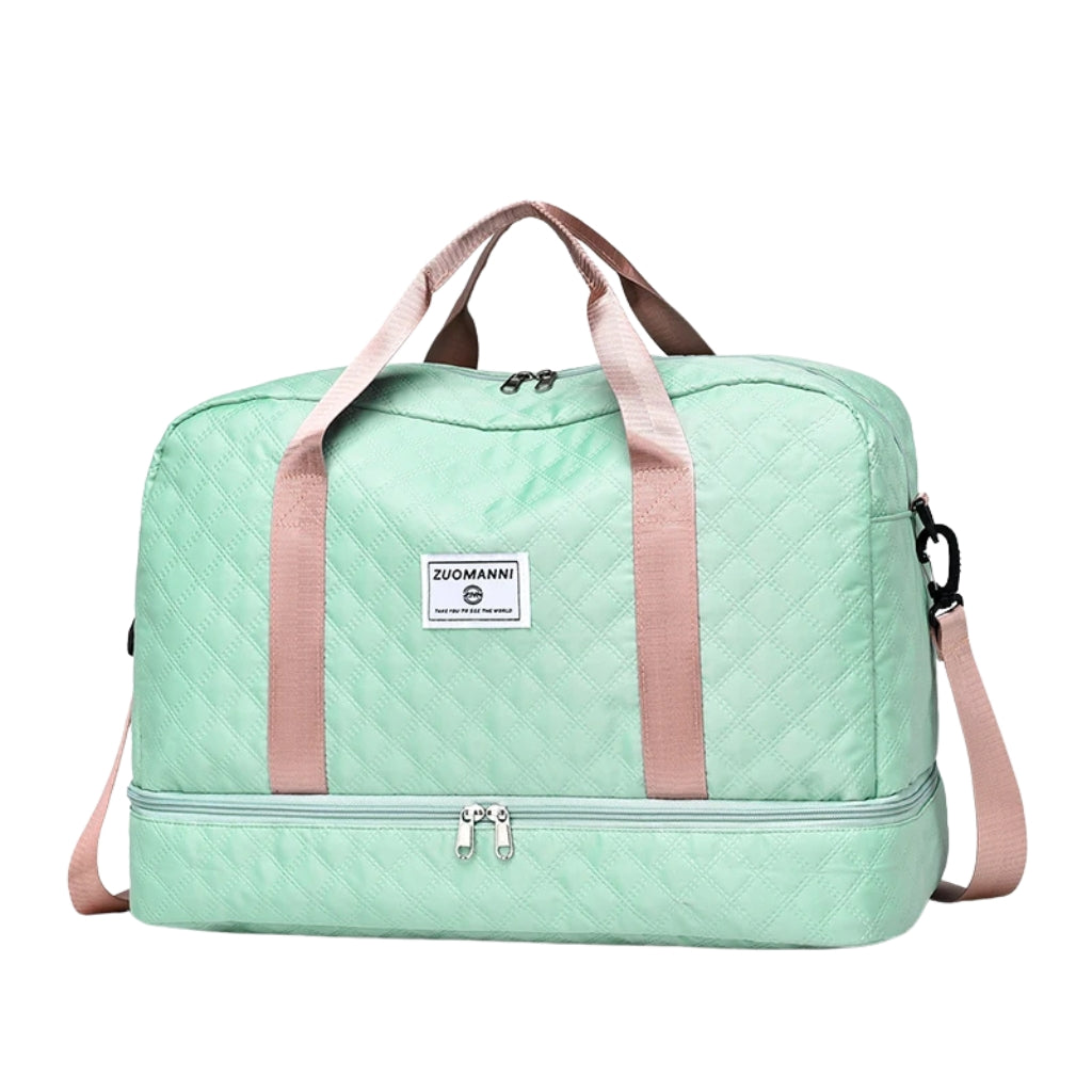 woman carrying pink travel duffel bag beside a suitcase
quilted travel duffel bags in pink and cream colors
lightweight nylon duffel bag placed on blue luggage
large soft travel bag with zipper closure and shoulder strap
weekender duffel bag shown in a travel setting