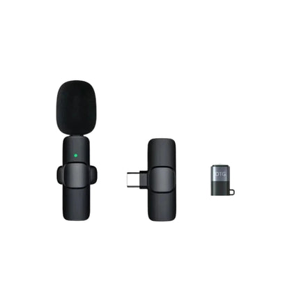 wireless microphone connected to a smartphone with USB C receiver
small lavalier microphone held beside a phone for recording
plug and play wireless microphone set with transmitter and receiver
portable microphones for phone video recording and live streaming
wireless lavalier mic shown with smartphone connection steps