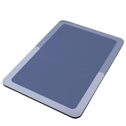 blue bathroom mat placed on a bathroom floor near a shower