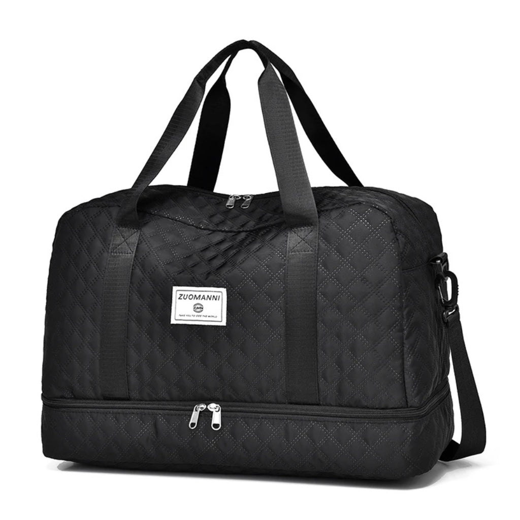 woman carrying pink travel duffel bag beside a suitcase
quilted travel duffel bags in pink and cream colors
lightweight nylon duffel bag placed on blue luggage
large soft travel bag with zipper closure and shoulder strap
weekender duffel bag shown in a travel setting
