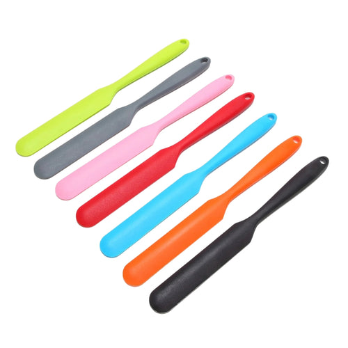 colorful silicone spatula set arranged on a kitchen counter