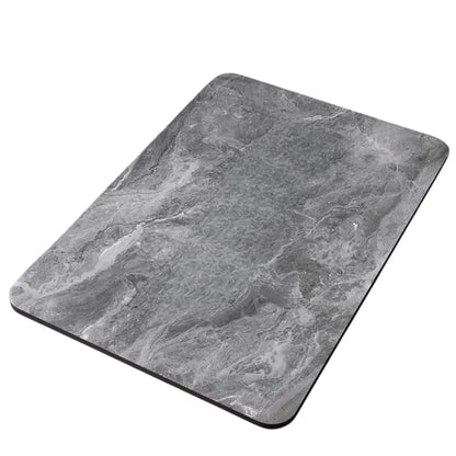 bathroom rug with rubber backing style on a tile floor