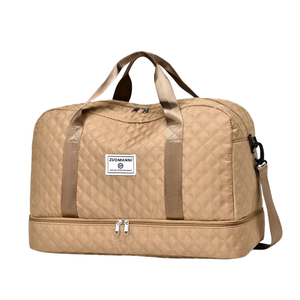 woman carrying pink travel duffel bag beside a suitcase
quilted travel duffel bags in pink and cream colors
lightweight nylon duffel bag placed on blue luggage
large soft travel bag with zipper closure and shoulder strap
weekender duffel bag shown in a travel setting