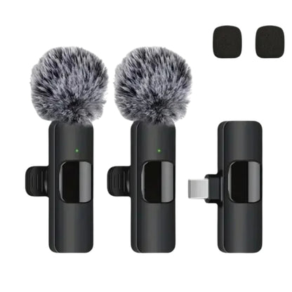 wireless microphone connected to a smartphone with USB C receiver
small lavalier microphone held beside a phone for recording
plug and play wireless microphone set with transmitter and receiver
portable microphones for phone video recording and live streaming
wireless lavalier mic shown with smartphone connection steps