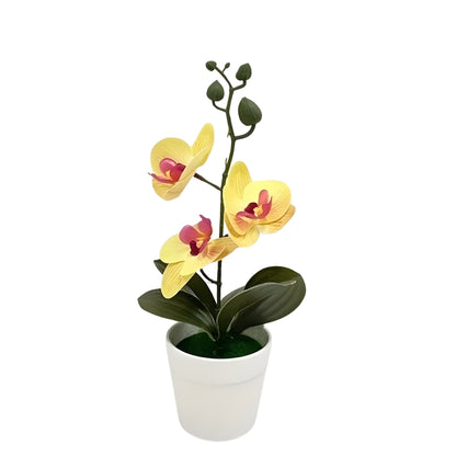artificial plant orchid with pink and white flowers in a white pot
faux orchid tabletop decor with green leaves and striped petals
artificial orchid flowers arrangement in white planter for indoor decor
potted artificial plant with orchid blooms for home or office display